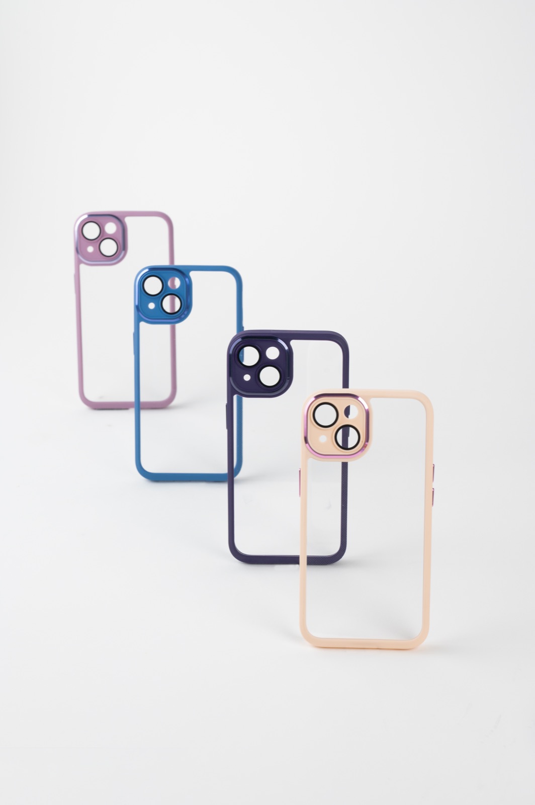 Four mobile phone cases arranged for a consistent e-commerce catalogue shoot