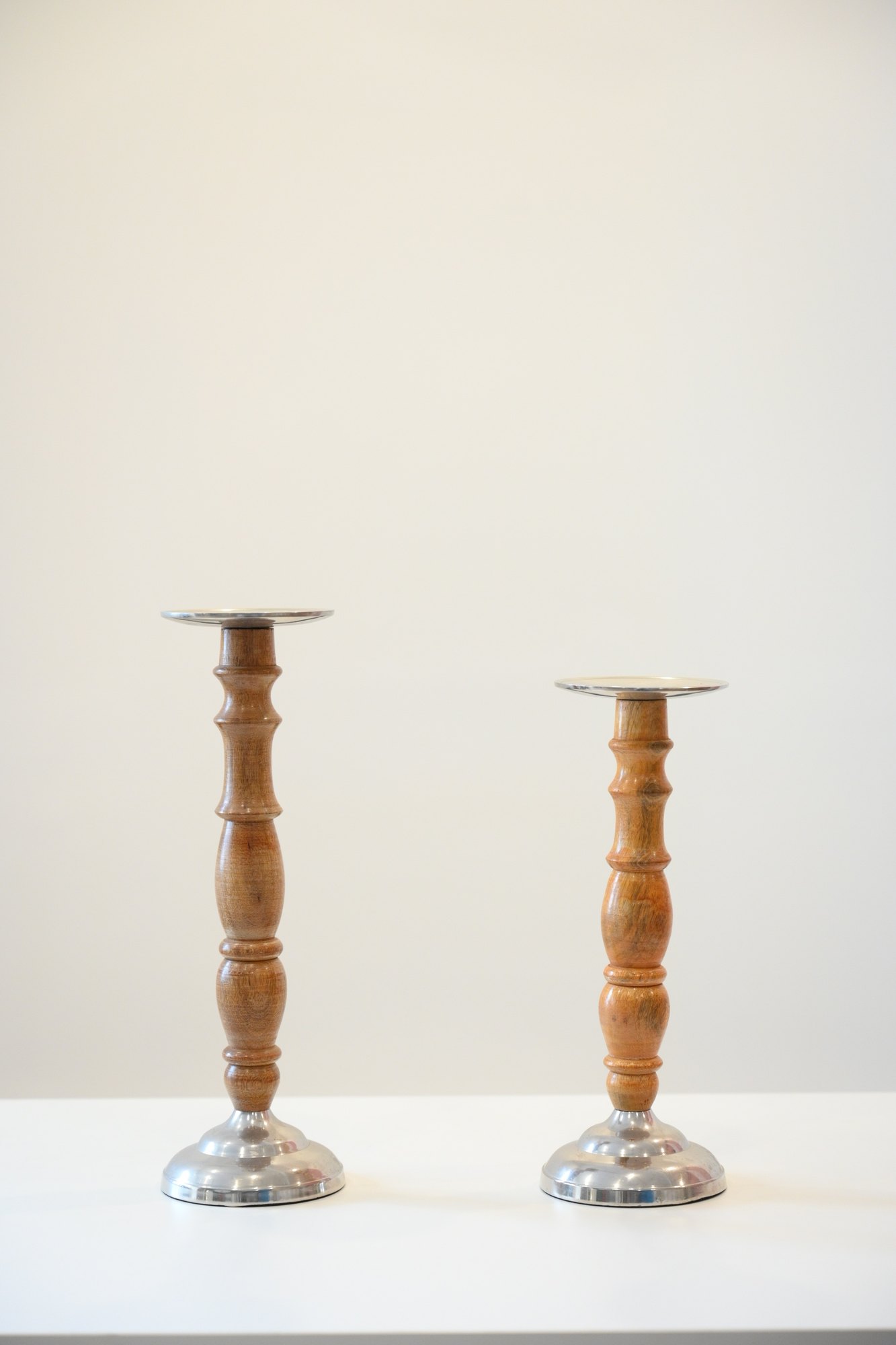 Pair of wood and glass candleholders