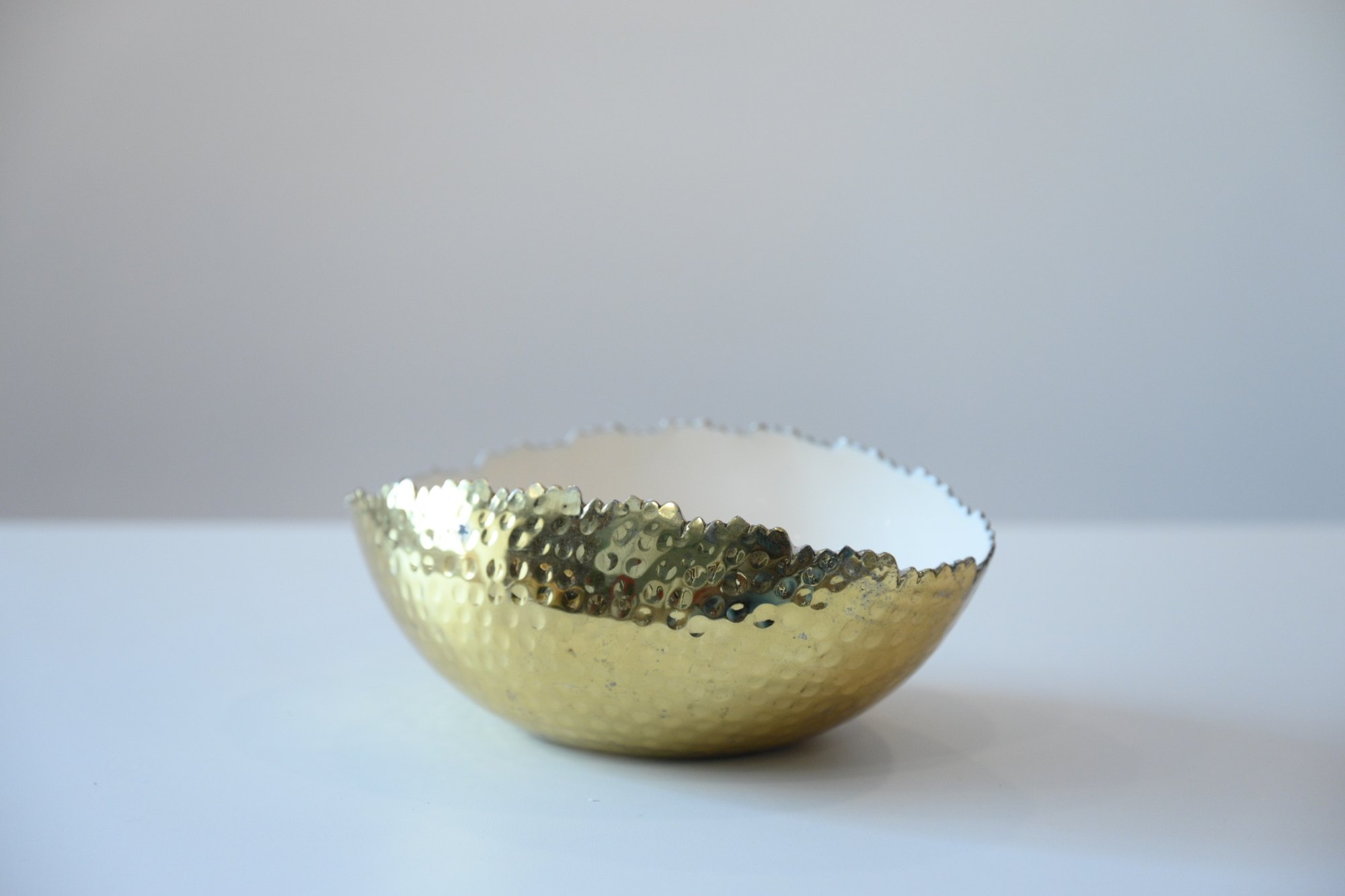 Wide brass styling bowl