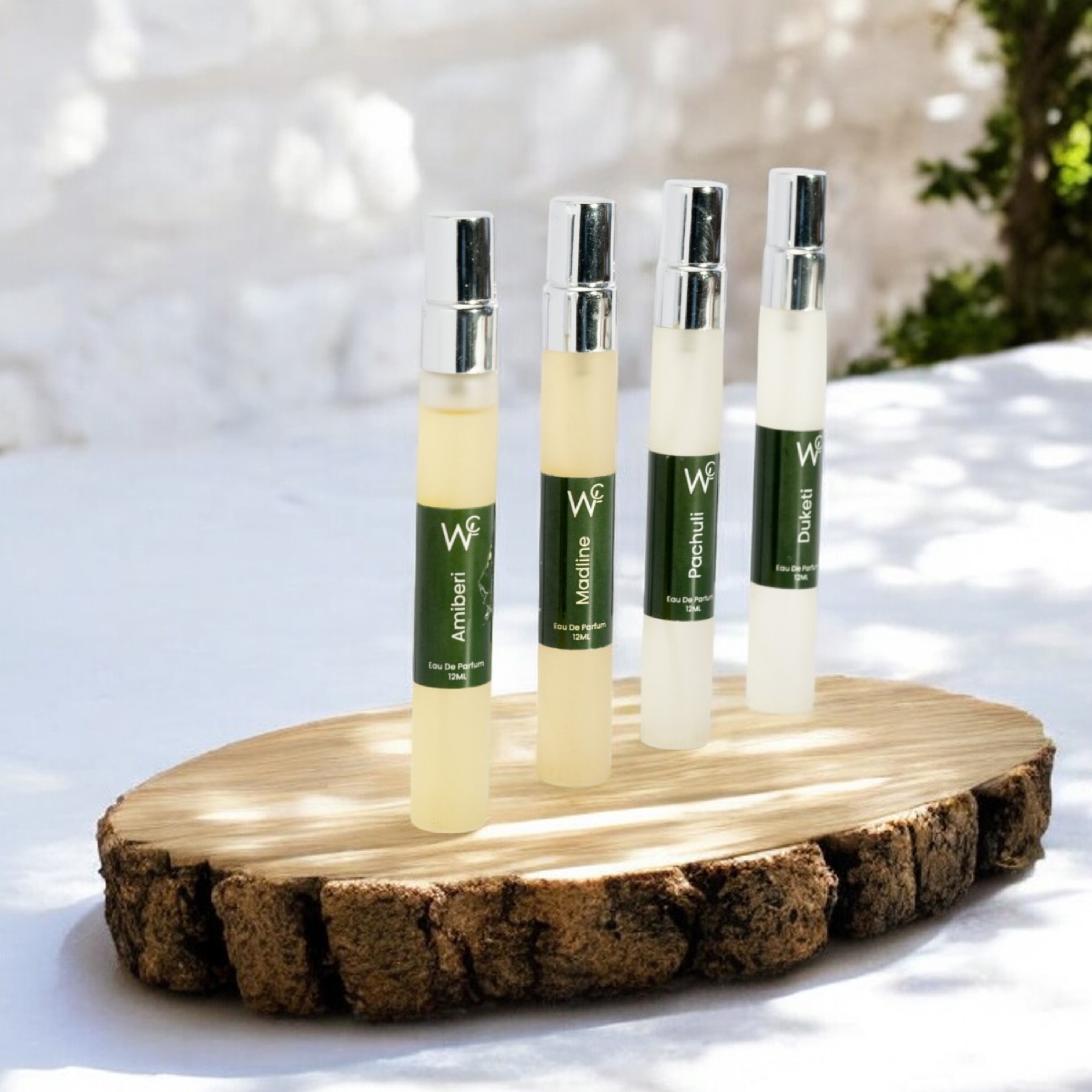 Perfume product photographed in a styled lifestyle setting