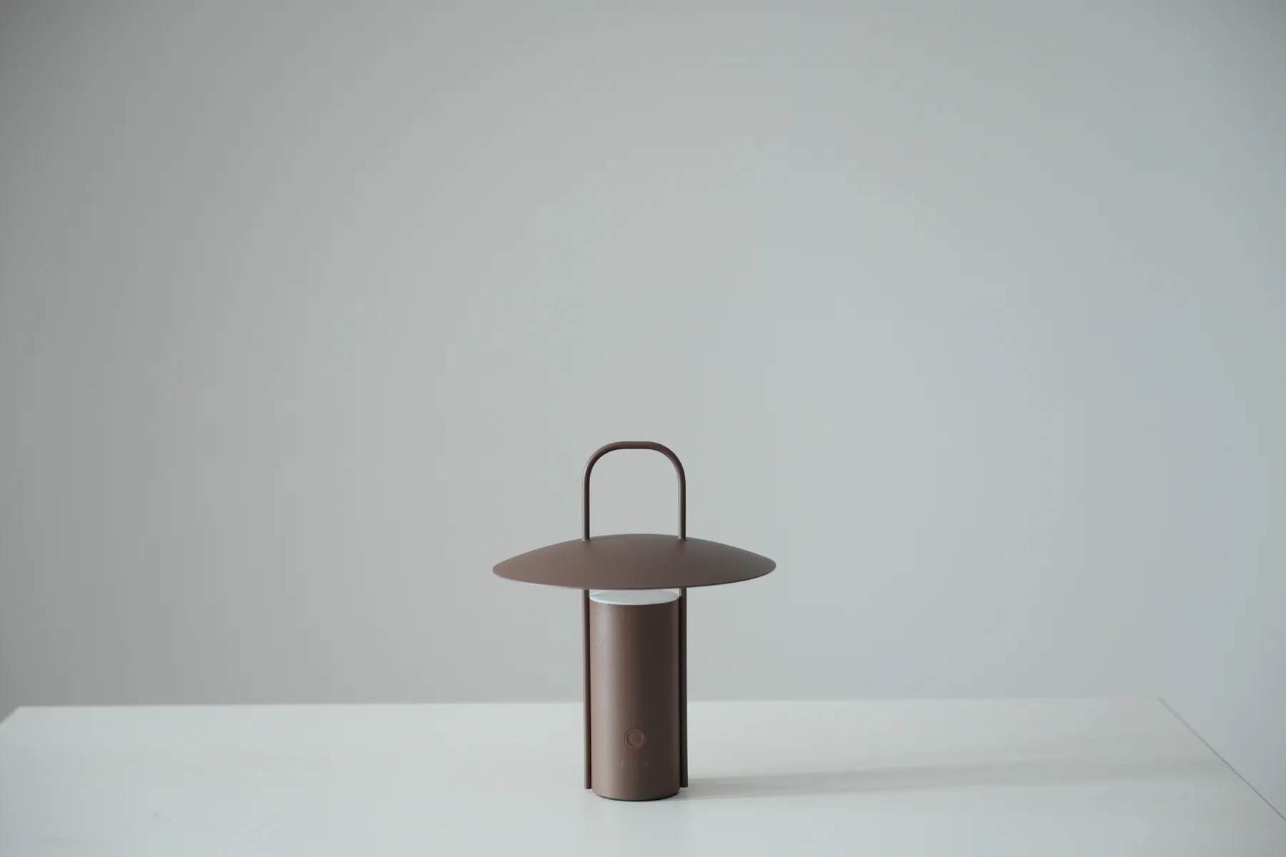 Brown handled rechargeable lantern available as a studio prop