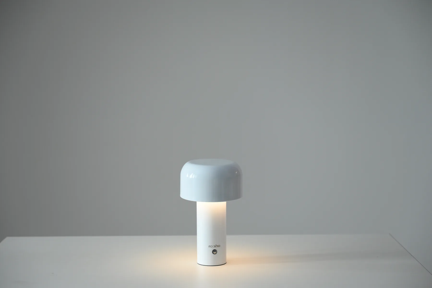 White dome table lamp available as a studio prop